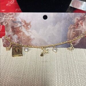 Gold Charm Necklace with Heart and Star Accents